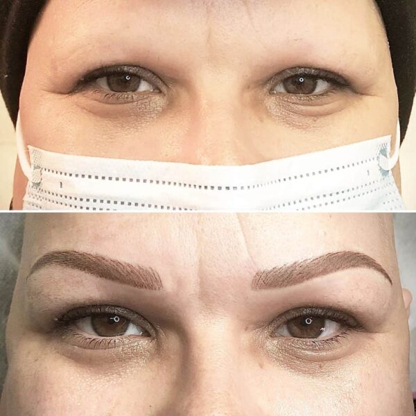 Gros plan sur des sourcils magnifiquement pigmentés avec une technique de tatouage permanent.