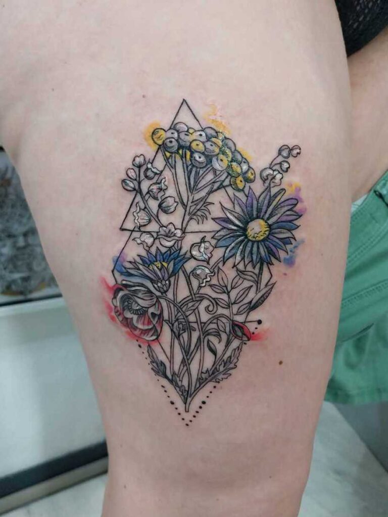 Illustration d'un tatouage artistique de bouquet de fleurs réaliste et coloré, parfait pour évoquer la symbolique des fleurs en tatouage.
